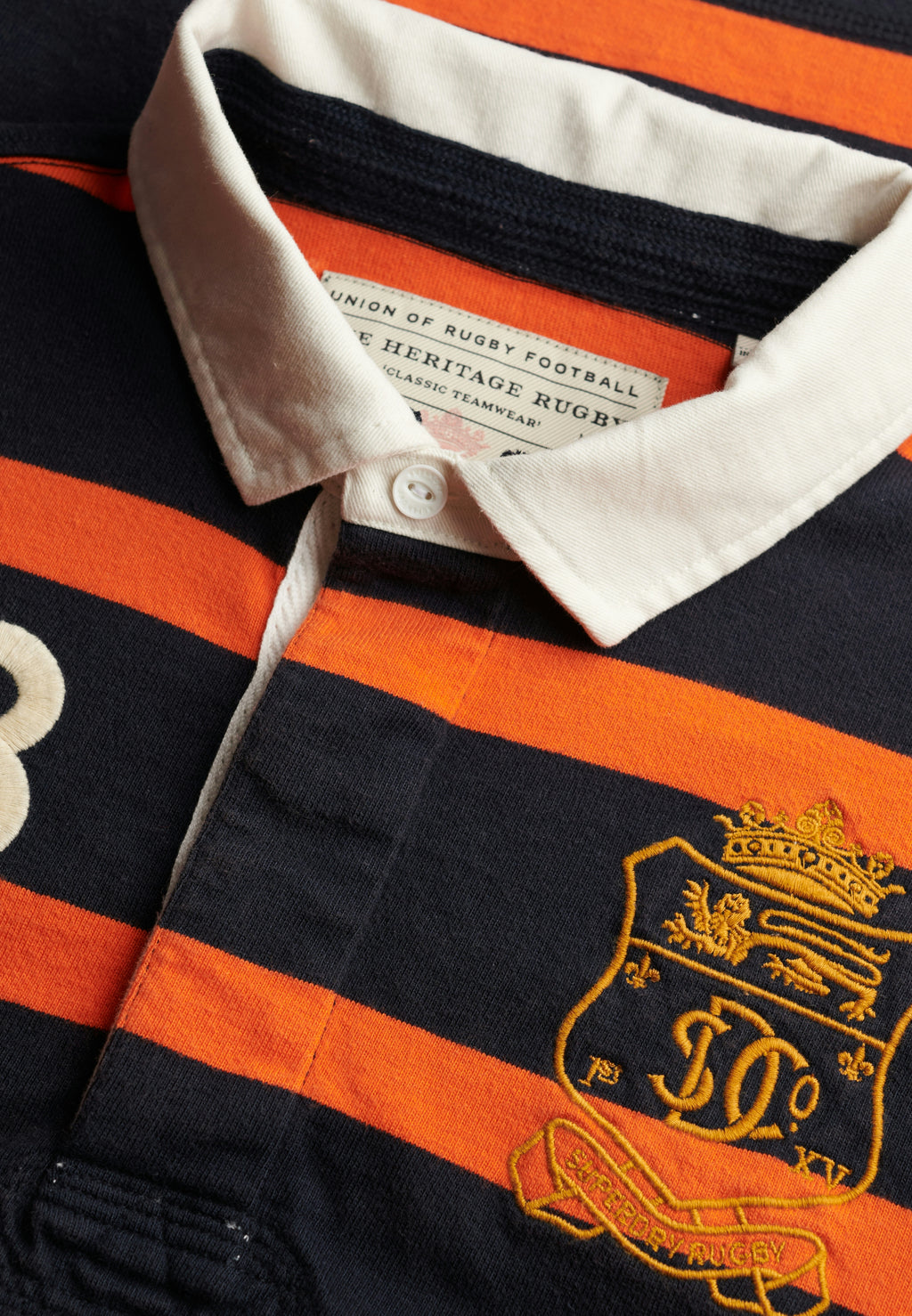 Double Emblem Stripe Rugby — Navy Orange Stripe